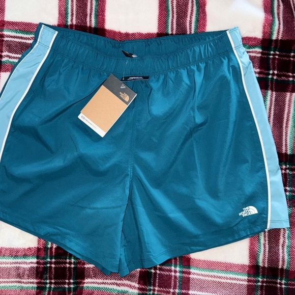 The North Face Pants - NWT The North Face Elevation side stripe shorts in teal SIZE L blue coral